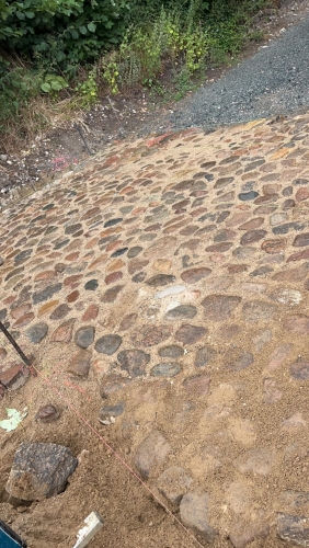 Belægning med brosten